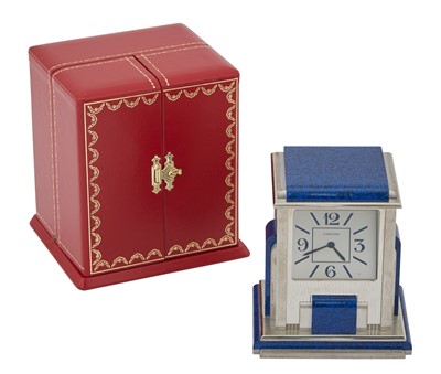 Lot 206 - Cartier Silver-Plate and Blue Lacquer Prism Mystery Clock