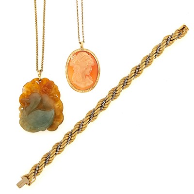 Lot 1084 - Two-Color Gold Bracelet, Carved Jade Pendant with Chain Necklace and Shell Cameo Pendant-Brooch with Chain Necklace