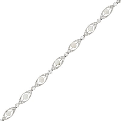 Lot 82 - Platinum, White Gold, Button Pearl and Diamond Bracelet, France
