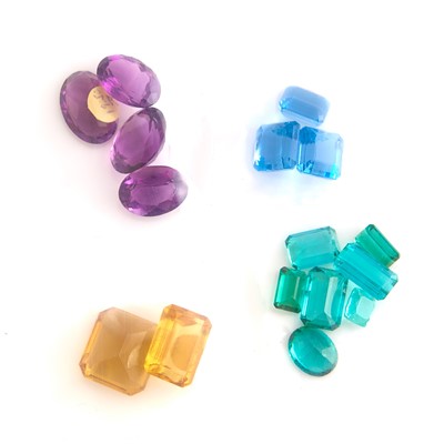 Lot 1244 - Group of Unmounted Blue Topaz, Tourmaline, Citrine and Amethyst
