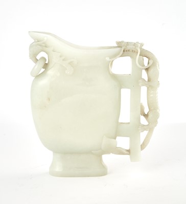 Lot 77 - A Large Chinese White Jade Pouring Vessel
