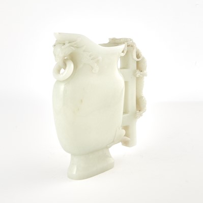 Lot 77 - A Large Chinese White Jade Pouring Vessel