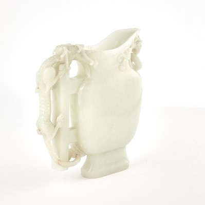 Lot 77 - A Large Chinese White Jade Pouring Vessel