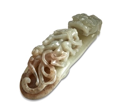 Lot 459 - A Chinese Celadon Jade Belt Hook
