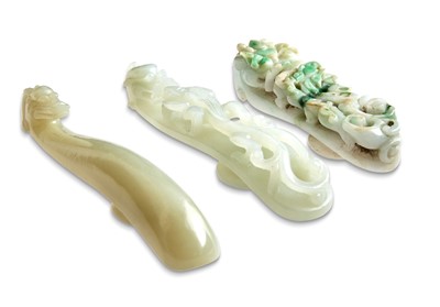 Lot 42 - A Group of Three Chinese Jade and Jadeite Belt Hooks