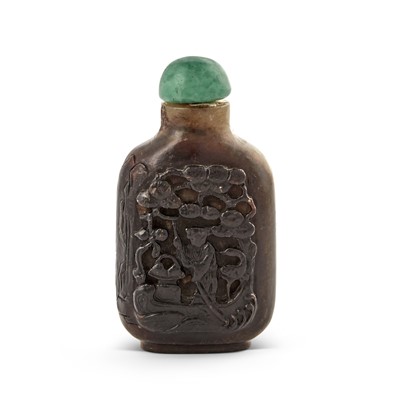 Lot 17 - A Chinese Carved Smoky Quartz Snuff Bottle