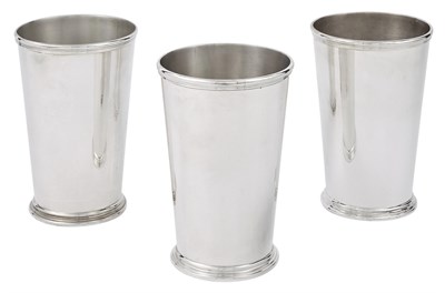 Lot 1051 - Three English Sterling Silver Oversized Beakers