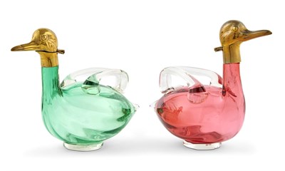 Lot 1039 - Two Continental Novelty Brass and Colored Glass Bird Form Decanters