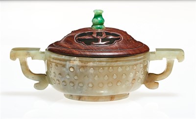 Lot 52 - A Chinese Celadon Jade Handled Cup