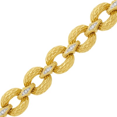 Lot 141 - Wide Two-Color Gold and Diamond Link Bracelet