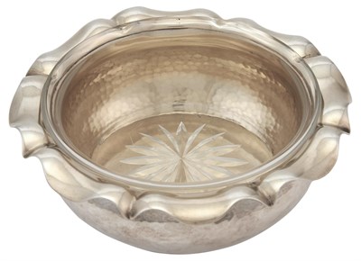 Lot 1044 - German Silver and Parcel-Gilt Bottle Coaster