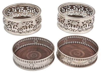 Lot 1009 - Two Pairs of English Silver-Plated Bottle Coasters