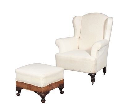 Lot 107 - Upholstered Dark Stained Wood Wing Chair and Ottoman