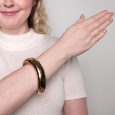 Lot 1028 - Angela Cummings Gold Bangle Bracelet