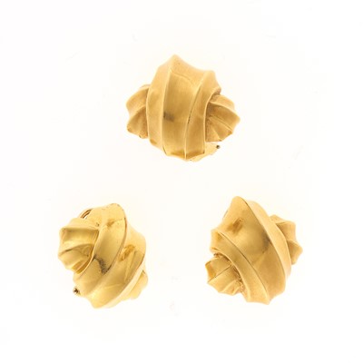 Lot 2047 - Angela Cummings Pair of Gold Earclips and Single Earring
