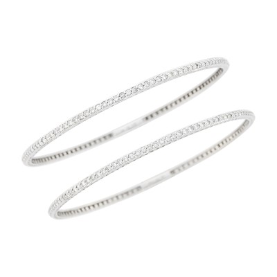 Lot 1071 - Pair of White Gold and Diamond Bangle Bracelets