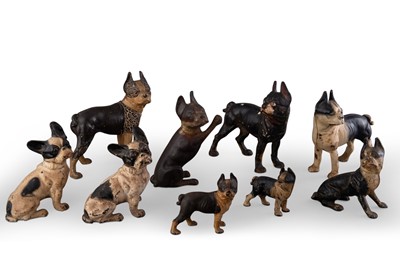 Lot 1057 - Nine Painted Cast Iron Dog Door Stops