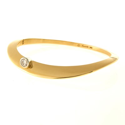 Lot 2004 - Gold and Diamond Bangle Bracelet