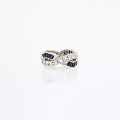 Lot 1075 - Platinum, Diamond and Sapphire Band Ring