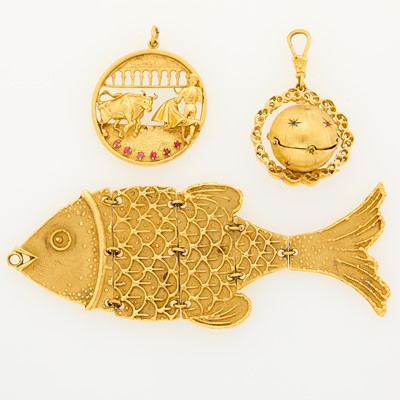 Lot 1173 - Three Gold Charms
