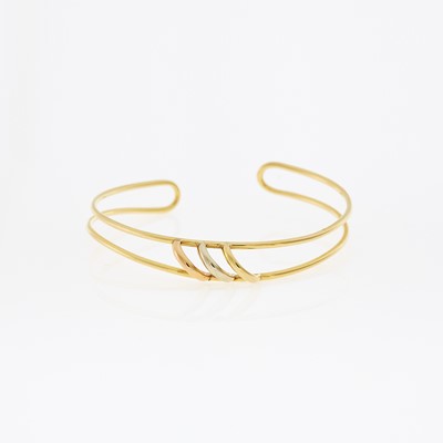 Lot 1110 - Cartier Tricolor Gold 'Trinity' Bangle Bracelet