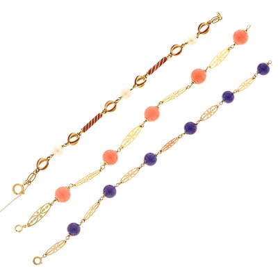 Lot 1236 - Three Gold, Red Enamel, Cultured Pearl, Blue and Pink Glass Bead Bracelet