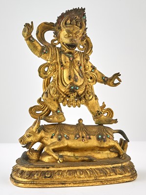Lot 553 - A Tibetan Gilt Bronze Figure of Yama