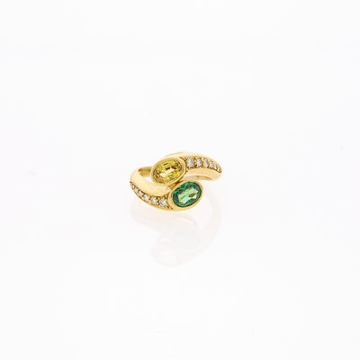 Lot 1214 - Gold, Green Garnet, Yellow Sapphire and Diamond Crossover Ring