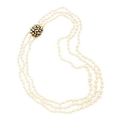 Lot 1142 - Triple Strand Cultured Pearl Necklace with Two-Color Gold Clasp