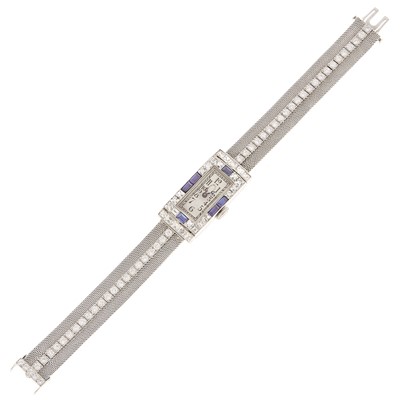 Lot 1045 - Platinum, Diamond and Sapphire Sapphire Bracelet-Watch
