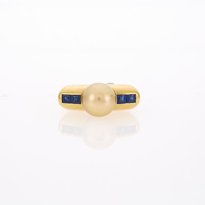 Lot 1208 - Gold, Golden Cultured Pearl and Sapphire Ring