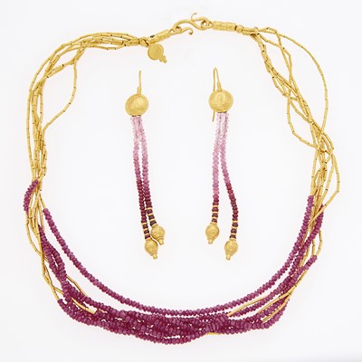 Lot 1192 - Seven Strand High Karat Gold, Ruby and Pink Sapphire Bead Torsade Necklace and Pair of Fringe Pendant-Earrings