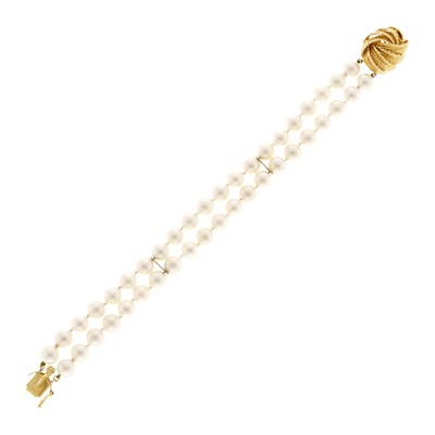 Lot 1144 - Double Strand Cultured Pearl and Gold Bracelet