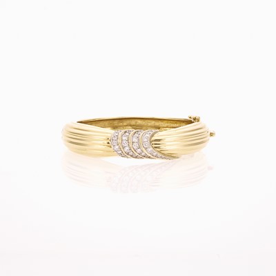 Lot 1011 - Gold and Diamond Bangle Bracelet