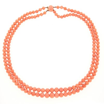 Lot 1168 - Double Strand Coral Bead Necklace with Gold and Coral Clasp