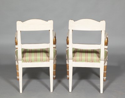Lot 666 - Pair of Continental Empire Painted and Parcel-Gilt Armchairs