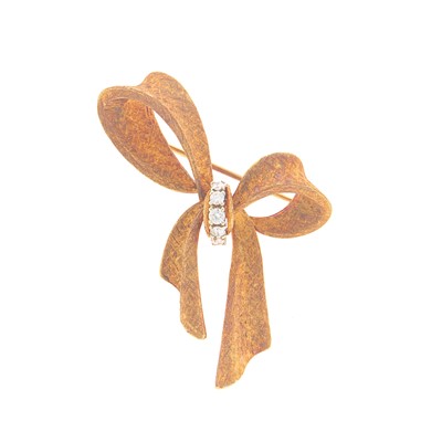 Lot 1152 - Gold and Diamond Bow Brooch