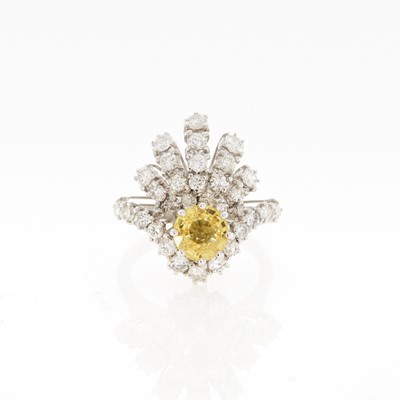 Lot 2176 - White Gold, Yellow Sapphire, and Diamond Ring