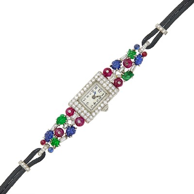 Lot 169 - Platinum, Carved Colored Stone and Diamond 'Tutti Frutti' Wristwatch, France