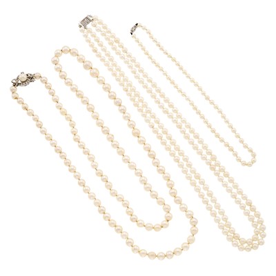 Lot 1259 - Three Cultured Pearl Necklaces with White Gold and Diamond Clasps