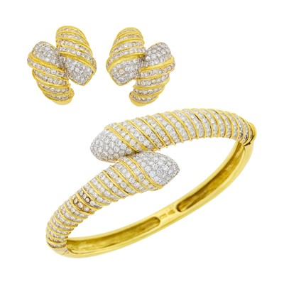 Lot 1012 - Gold and Diamond Bangle Bracelet and Pair of Earrings