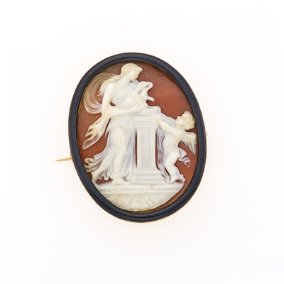Lot 2122 - Antique Gold, Sardonyx Cameo and Black Enamel Brooch