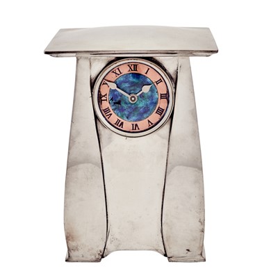 Lot 247 - Archibald Knox for Liberty & Co. Pewter and Enamel Tudric Pattern Mantel Clock