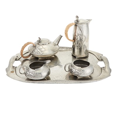 Lot 246 - Archibald Knox for Liberty & Co. Pewter Tudric Pattern Coffee and Tea Service