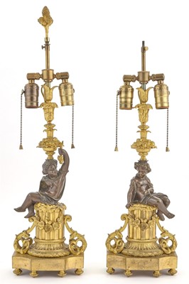 Lot 345 - Pair of Louis XVI Style Patinated- and Gilt-Bronze Figural Lamps
