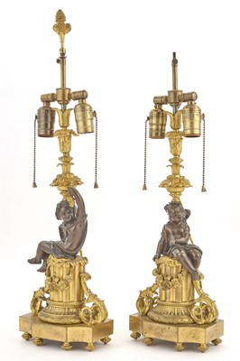 Lot 345 - Pair of Louis XVI Style Patinated- and Gilt-Bronze Figural Lamps