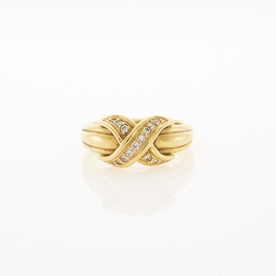 Lot 2087 - Tiffany & Co. Gold and Diamond 'X' Ring