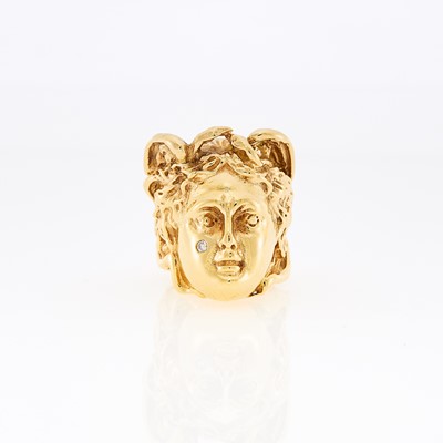 Lot 1214 - Gold and Diamond Medusa Head Ring