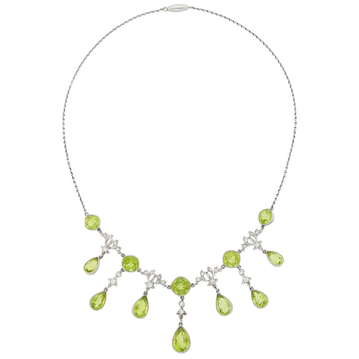 Lot 1155 - Edwardian Platinum, Gold, Peridot and Diamond Fringe Necklace