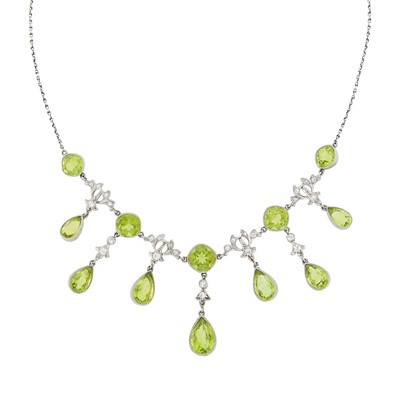 Lot 1155 - Edwardian Platinum, Gold, Peridot and Diamond Fringe Necklace